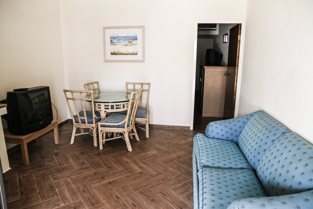 Living area inside a Kite Inn apartment with natural light